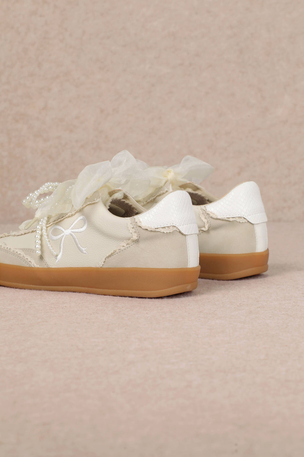 JULIE: Ivory Bow Sneaker