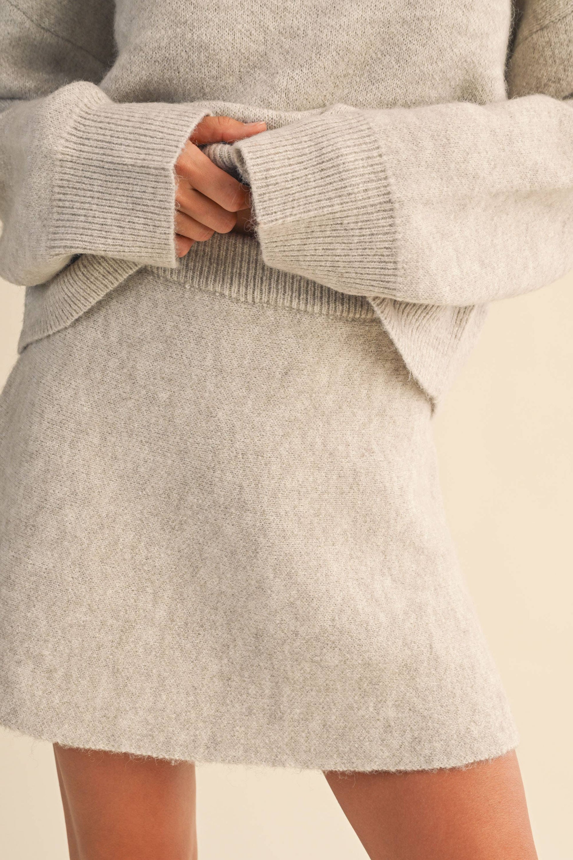 LONG SLEEVE SWEATER TOP AND FLARED MINI SKIRT SET