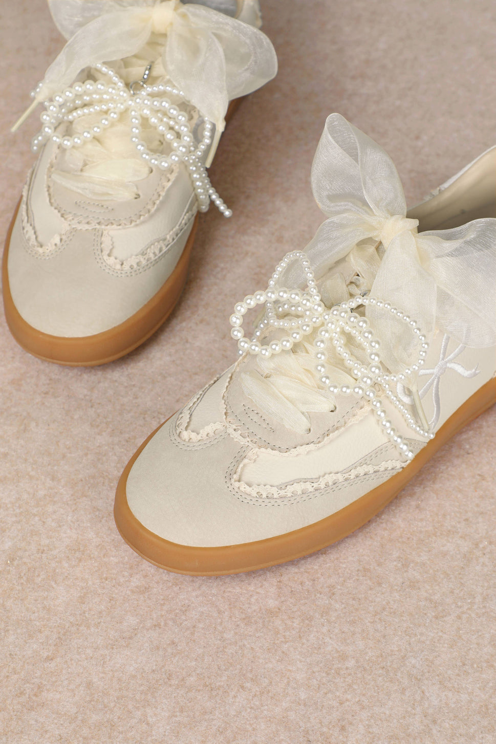 JULIE: Ivory Bow Sneaker