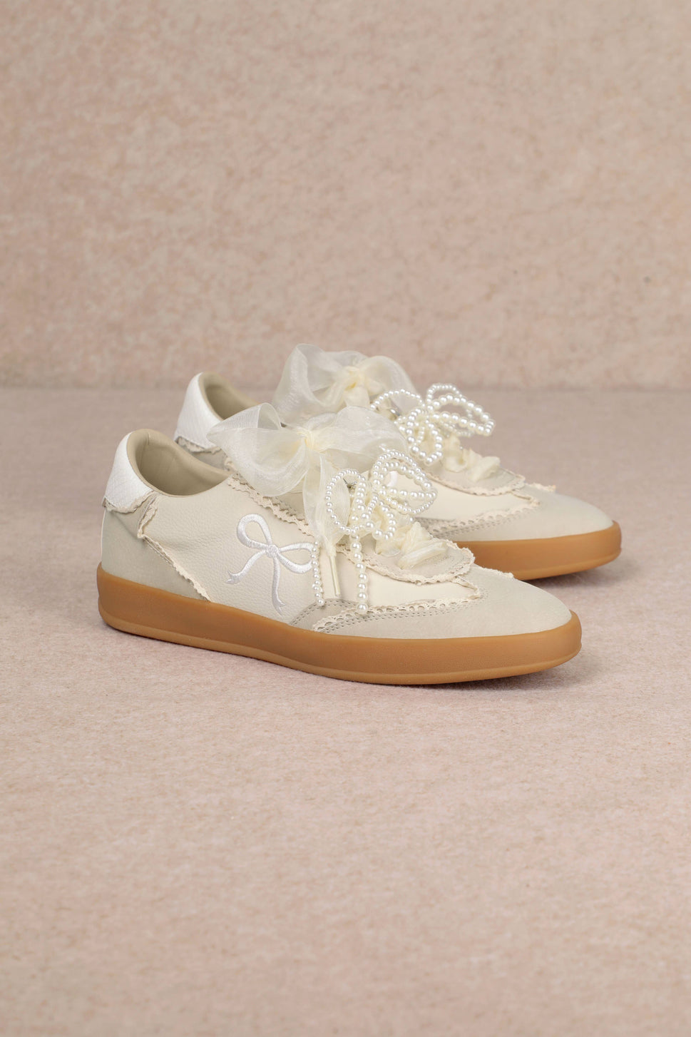 JULIE: Ivory Bow Sneaker