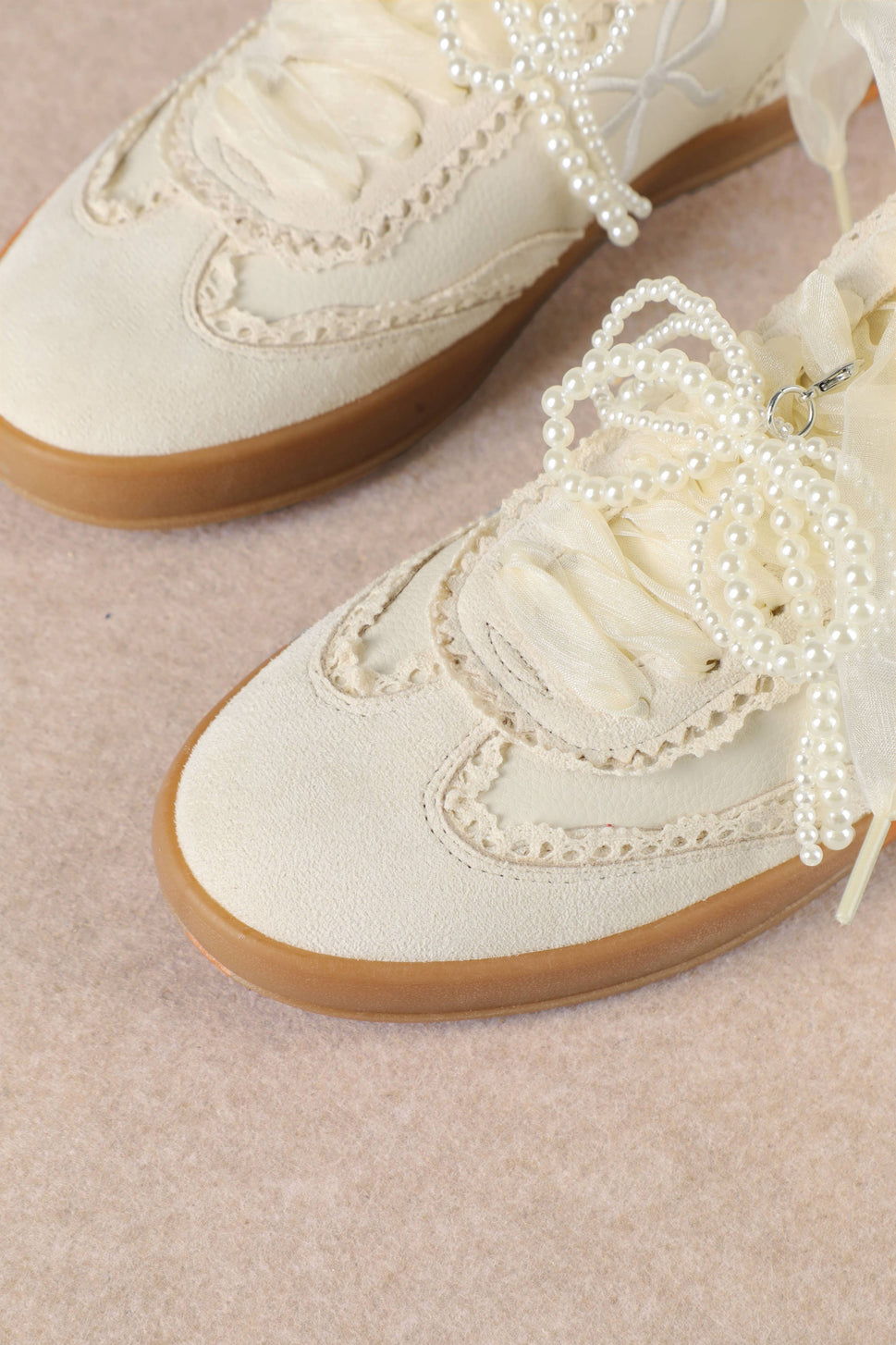 JULIE: Ivory Bow Sneaker