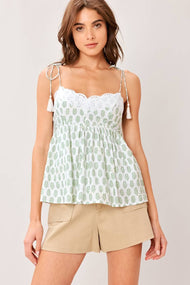 A printed woven eyelet top green