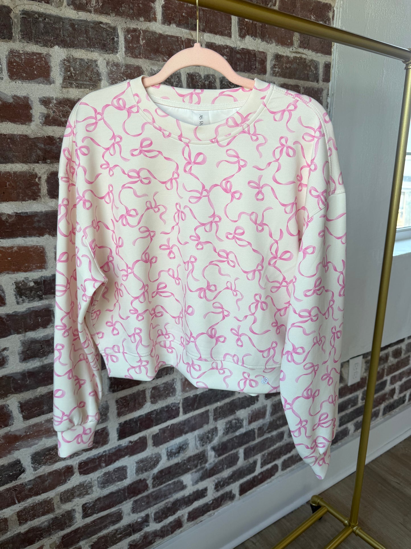 as pink bow sweatshirt