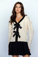 Switch CABLE KNIT CARDIGAN WITH BOWS 2 image