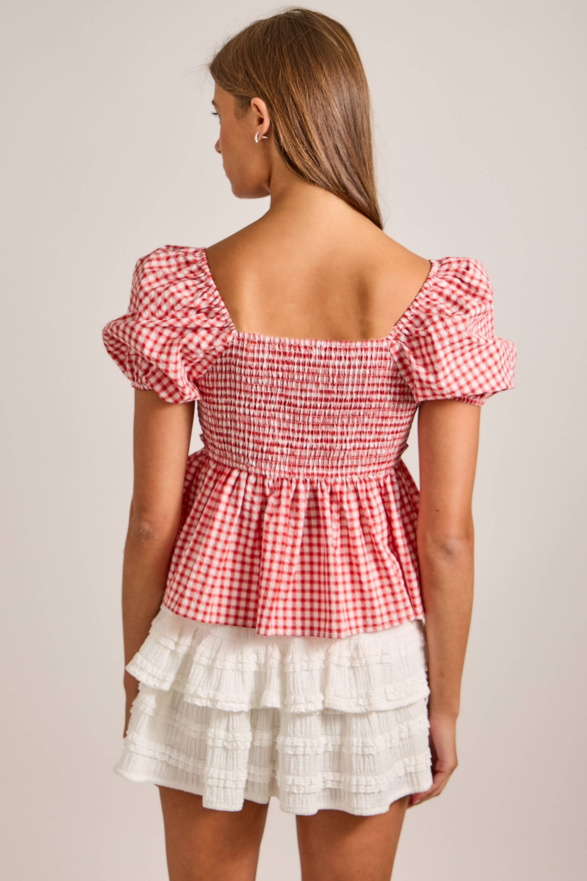 Short puff sleeve gingham top with contrast ruffle detail