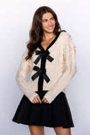 Switch CABLE KNIT CARDIGAN WITH BOWS 1 image